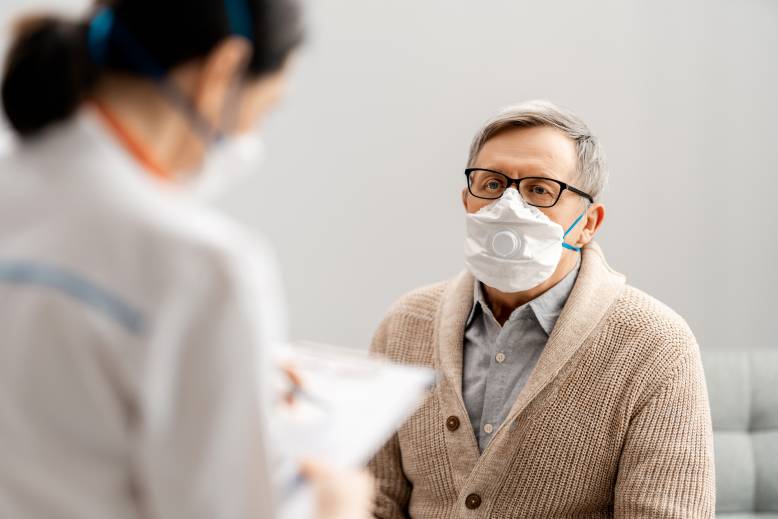 HCP patients doctor and patient exam with masks